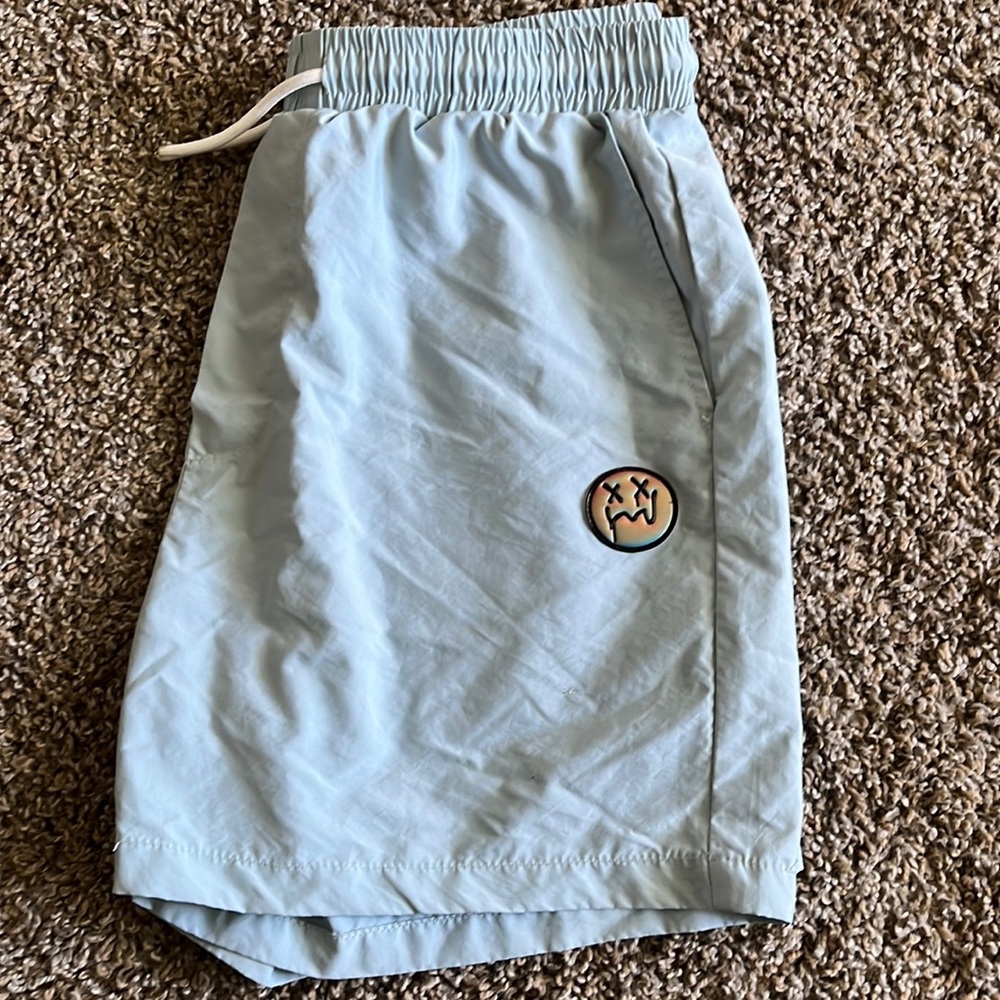 Size Small mens short! Light blue with cute little smiley decal
